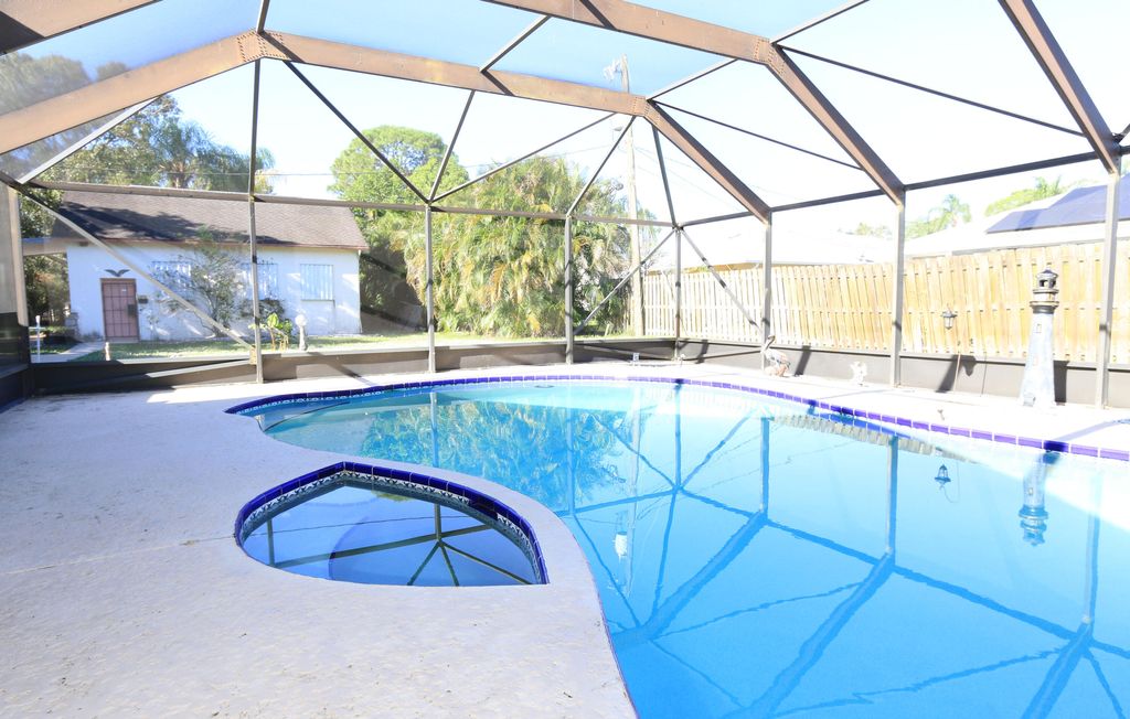 Photo of 297 SE Twig Avenue, Port St Lucie, FL 34983 (MLS # R10848721)