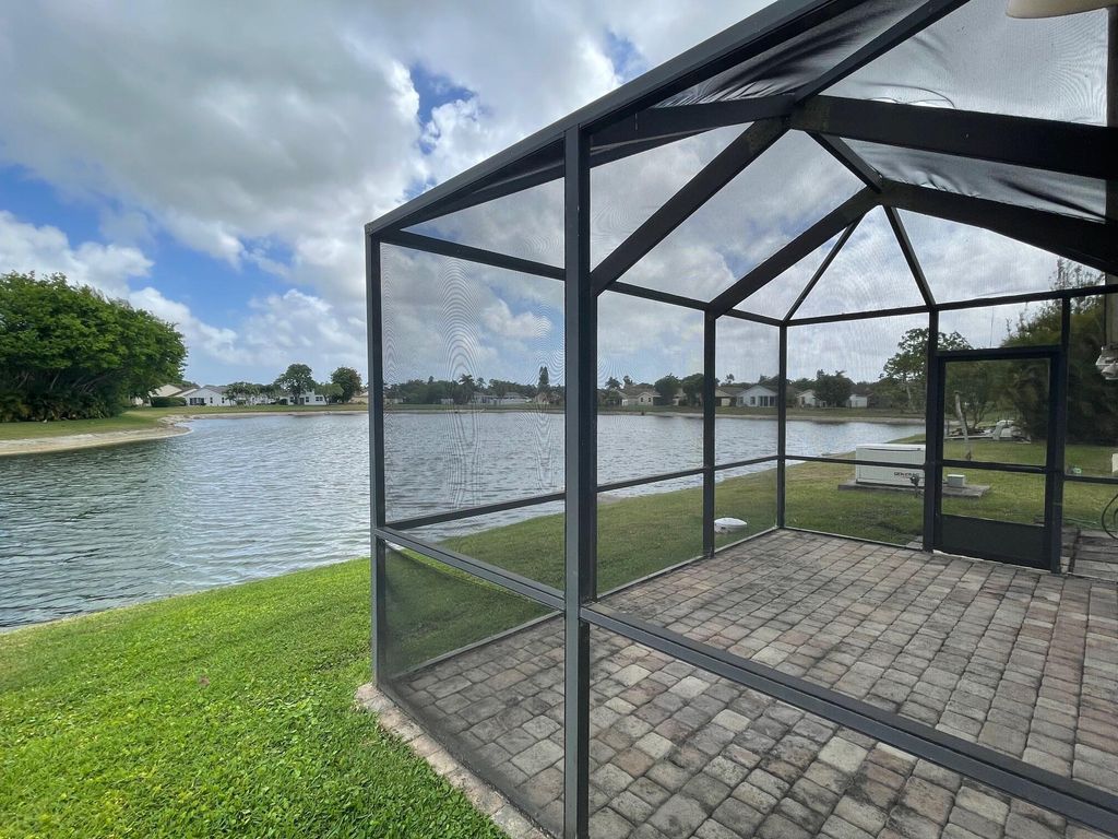 Photo of 9151 Pine Springs Drive, Boca Raton, FL 33428 (MLS # R11077733)