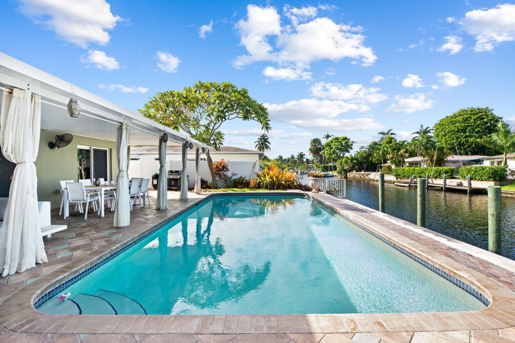 Photo of 1611 SW 3RD Avenue, Pompano Beach, FL 33060 (MLS # B26091502)