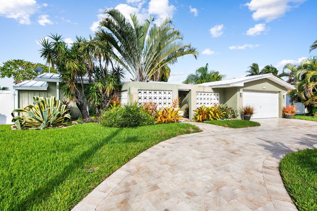Photo of 1611 SW 3RD Avenue, Pompano Beach, FL 33060 (MLS # B26091502)