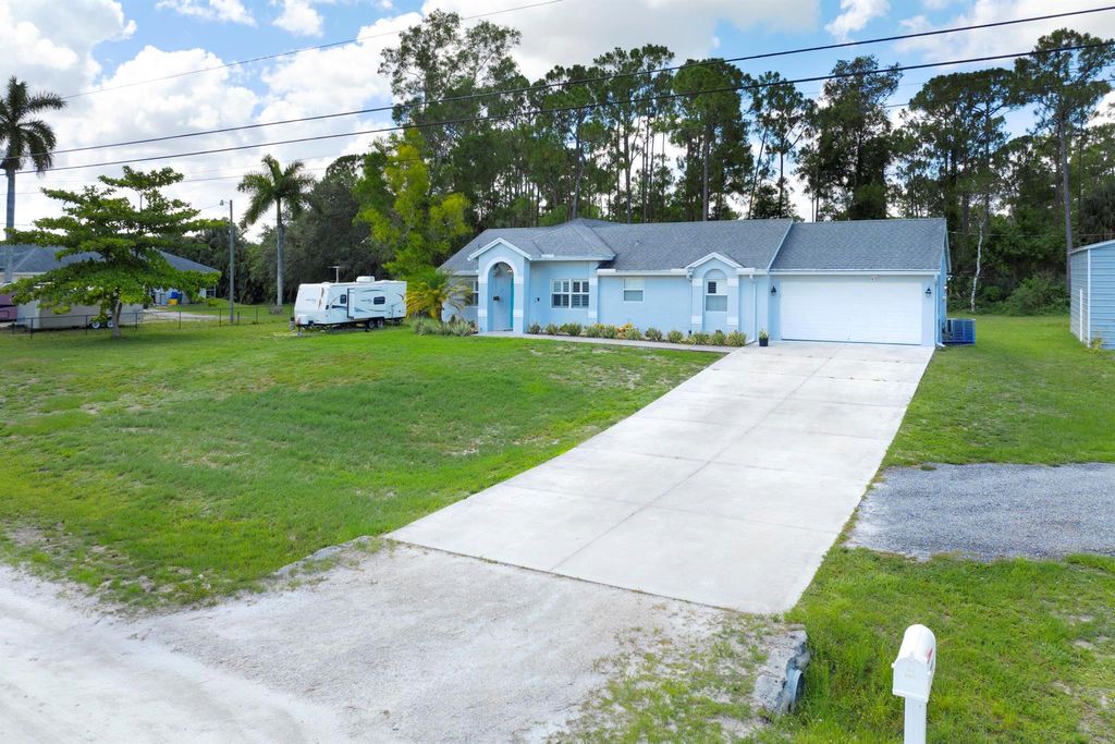 Photo of 14676 N 86th Road N, The Acreage, FL 33470 (MLS # R11100311)