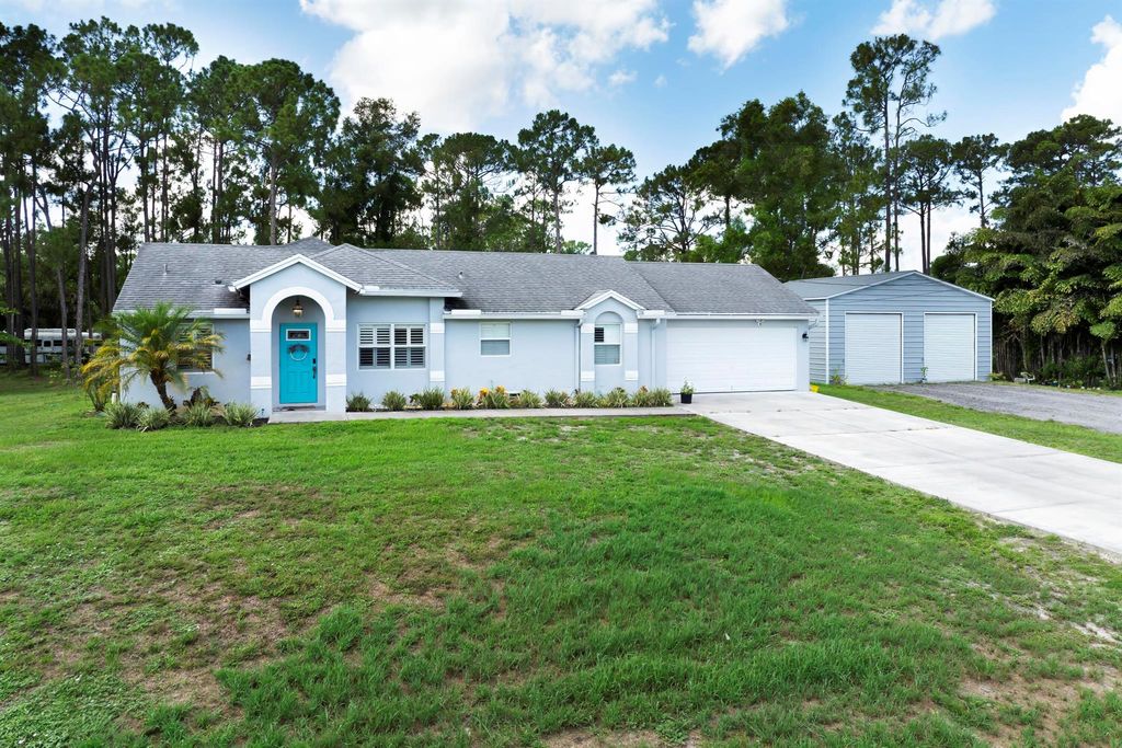 Photo of 14676 N 86th Road N, The Acreage, FL 33470 (MLS # R11100311)