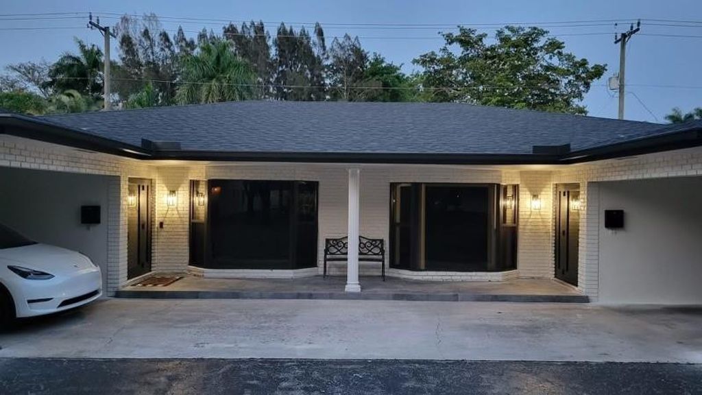 Photo of 400 Holloway Drive, Plantation, FL 33317 (MLS # F10441436)