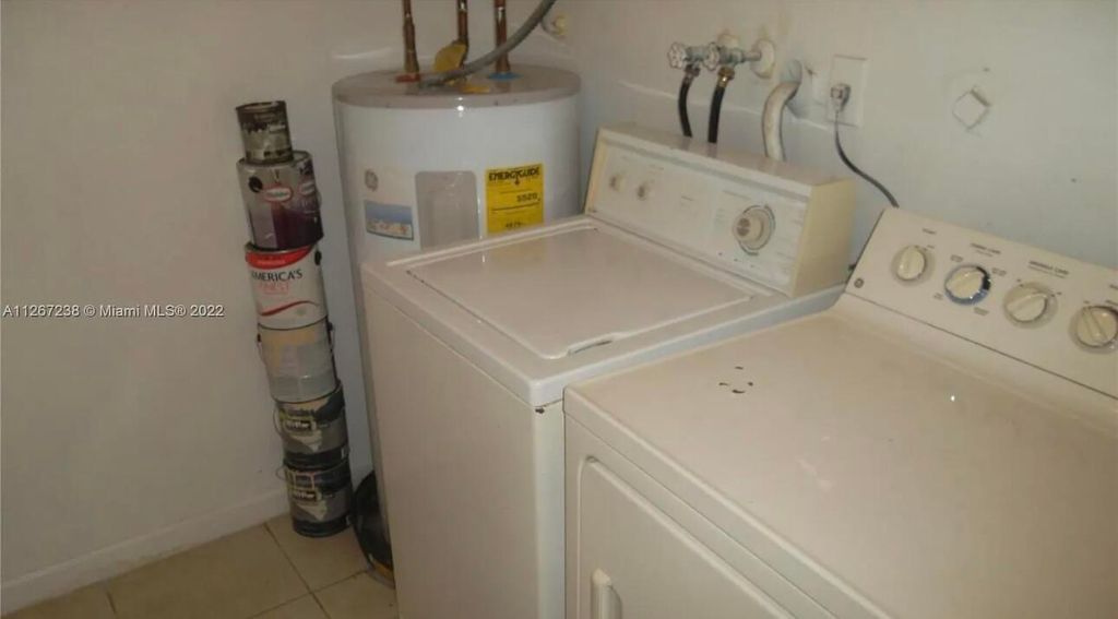 Photo of 220 San Remo Boulevard, North Lauderdale, FL 33068 (MLS # B26005813)