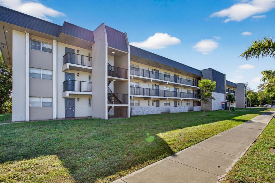 Excellent investment opportunity with no rental restrictions. This spacious 2-bedroom, 2-bath residence is situated within a highly desirable gated community in the heart of Tamarac. an in unit washer and dryer , generously sized bedrooms with walk-in closets, and a large screened balcony with tranquil golf course views. The community offers an extensive range of amenities, including roaming security, two pools, a clubhouse, tennis and racquet courts, a fitness center, a basketball court, and a BBQ/picnic area. Water is included in the association fees, and ample guest parking is available for both residents and visitors. Whether you are looking for a strong investment property or a comfortable place to call home.