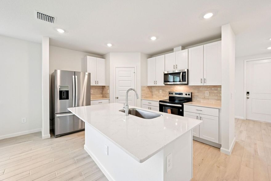 Brand NEW energy-efficient home ready Dec 2025! 60 day closing ready guarantee! Inquire about below market rates and incentives!Upgrades include all appliances, window blinds, smart home technology, a garage door opener, and quartz countertops First-floor primary suite provides the ultimate in privacy. Flex room as well as second-floor loft offers flexible living to meet your family's needs. Enjoy preparing meals with your family in the open kitchen with spacious work island. Homeowners will enjoy a gated communityof homes built with the innovative, energy-efficient features. With easy access to I-95 and downtown Vero Beach, HamptonPark is ideally close to shopping and dining, entertainment, and pristine beaches.