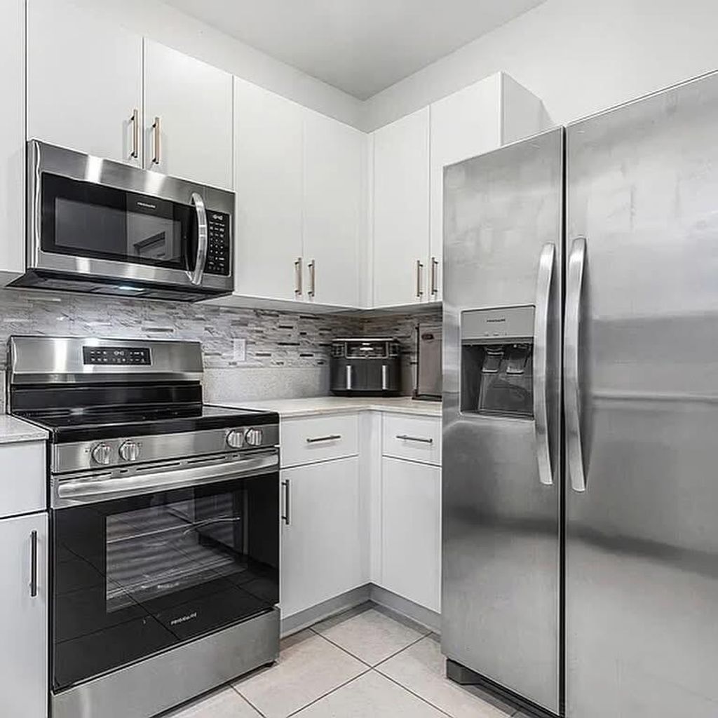 Photo of 2781 NW Nw 55th Way, Lauderhill, FL 33313 (MLS # R11146617)