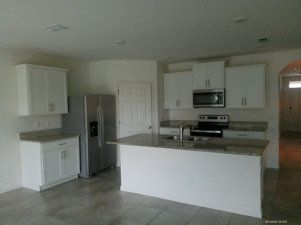 Photo of 10574 SW Jem Street, Port Saint Lucie, FL 34987 (MLS # R10967675)