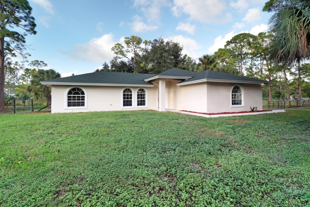 Photo of 16441 87TH Lane N, The Acreage, FL 33470 (MLS # B26063092)