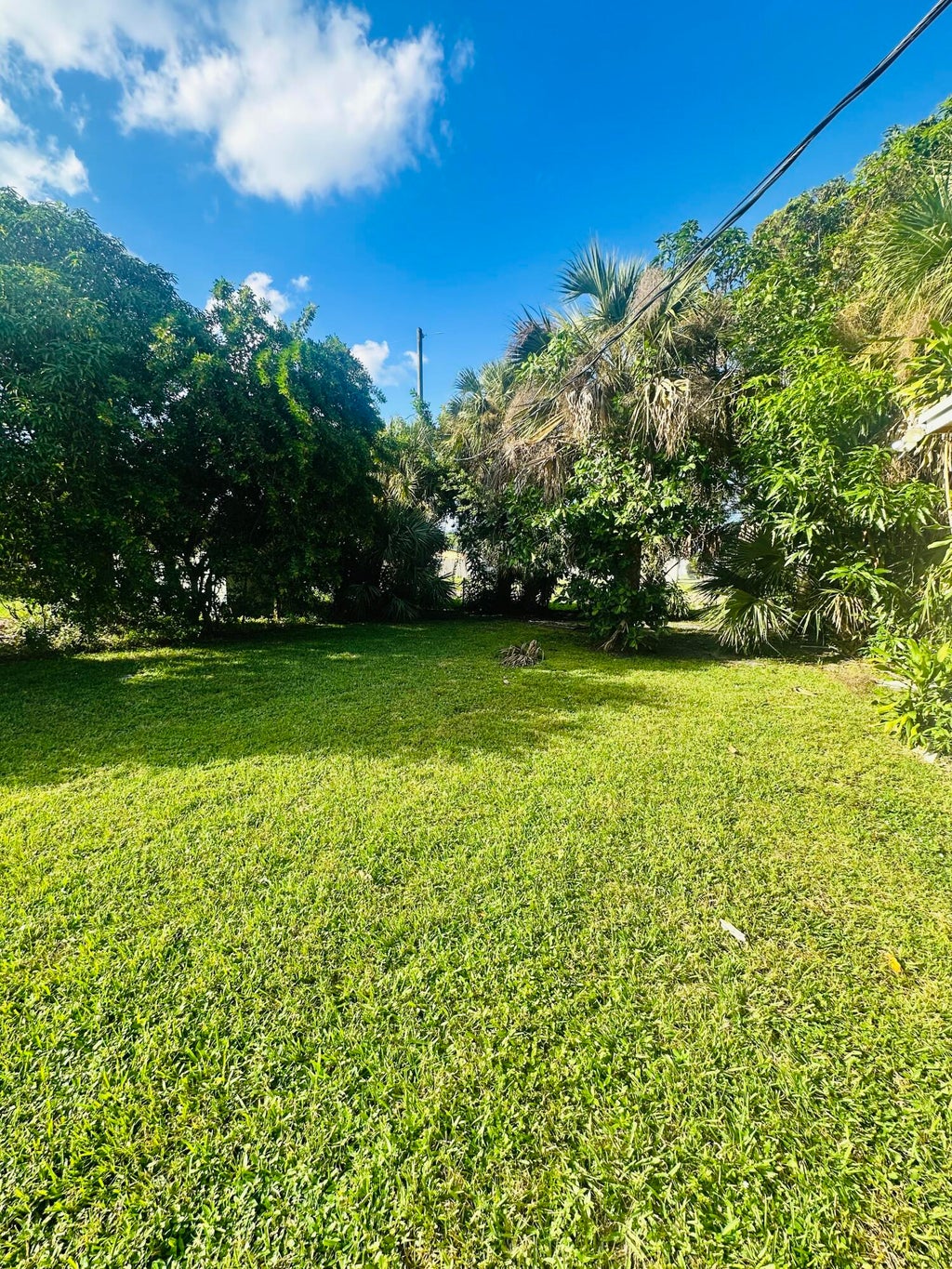 Photo of 1572 W 10th Street, Riviera Beach, FL 33404 (MLS # B26093298)