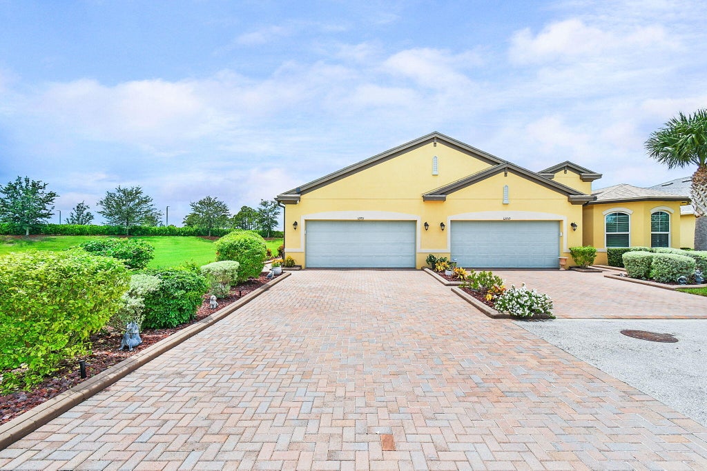 Photo of 12761 SW Lake Fern Circle, Port Saint Lucie, FL 34987 (MLS # R11010968)