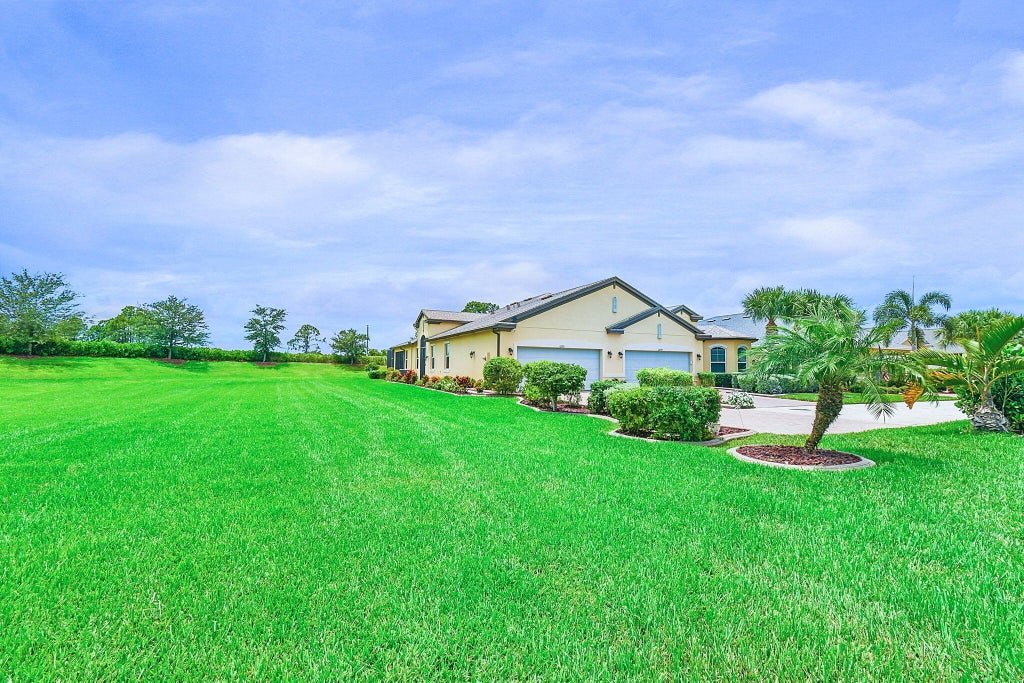 Photo of 12761 SW Lake Fern Circle, Port Saint Lucie, FL 34987 (MLS # R11010968)