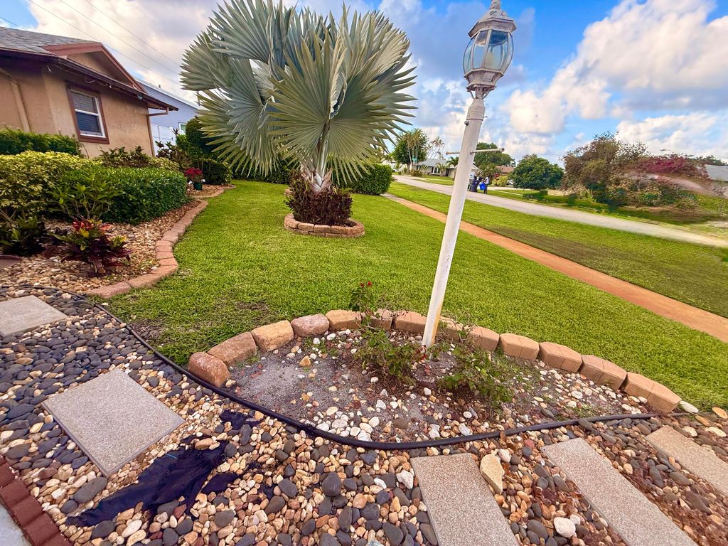 Photo of 5279 W Woodstone Cir Circle W, Lake Worth, FL 33463 (MLS # B26011523)