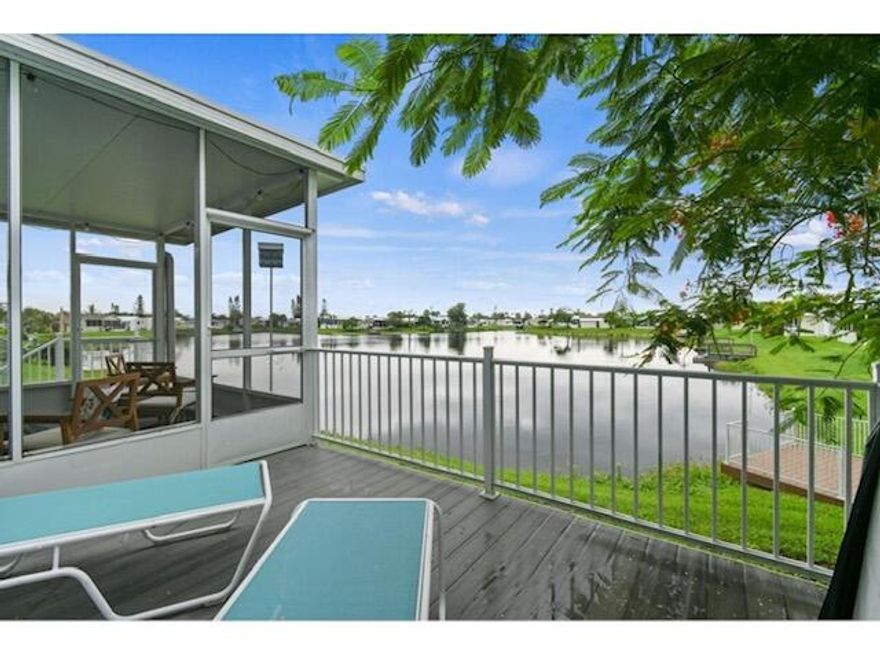 Discover resort-style living close to the shores of Lake Okeechobee at Blue Cypress Golf & RV Resort. Ideally situated along the lake's northeast side, this 55+ and pet friendly community features 248 homes and RV lots. Residents enjoy a 9-hole golf course, vibrant clubhouse, and a sparkling resort pool--heated in winter and cooled in summer--along with pickleball and shuffleboard courts. Multiple tranquil interior lakes provide exceptional freshwater fishing, while the community marina offers complimentary boat docking with access to Lake Okeechobee for qualifying vessels. Renowned for trophy largemouth bass and speckled perch, the lake is a true angler's paradise.  FULLY FURNISHED! This FULLY FURNISHED 2022 Skyline Palm Bay Park Model home offers over 3,000 square feet of total space, including approximately 1,100 sqft of air-conditioned living area. The well-appointed kitchen features stainless steel appliances, granite countertops, a center island, and a brand-new Brio water system. The spacious living room overlooks a peaceful lake setting and opens to a 13' x 12' screened patio complete with impact-resistant double doors and a private hot tub.
 
The thoughtfully designed floor plan includes two bedrooms and one-and-a-half baths. The primary suite is enhanced by a premium king-size Tempur-Pedic adjustable mattress (an $8,000 value) and generous built-in storage unit. Additional highlights include a newly installed water softener (2024) with a 10-year warranty, fresh interior paint, vinyl flooring, crown molding, and a full-size washer and dryer. An attached garage provides convenient storage for a golf cart, bicycles, or recreational gear.

All information is deemed reliable and subject to errors, omissions and change without notice. All measurements are approximate.