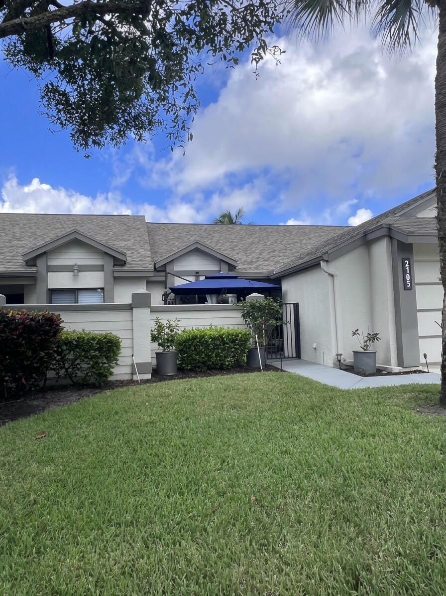 Photo of 2105 LANDINGS Boulevard, Greenacres, FL 33413 (MLS # B26087308)