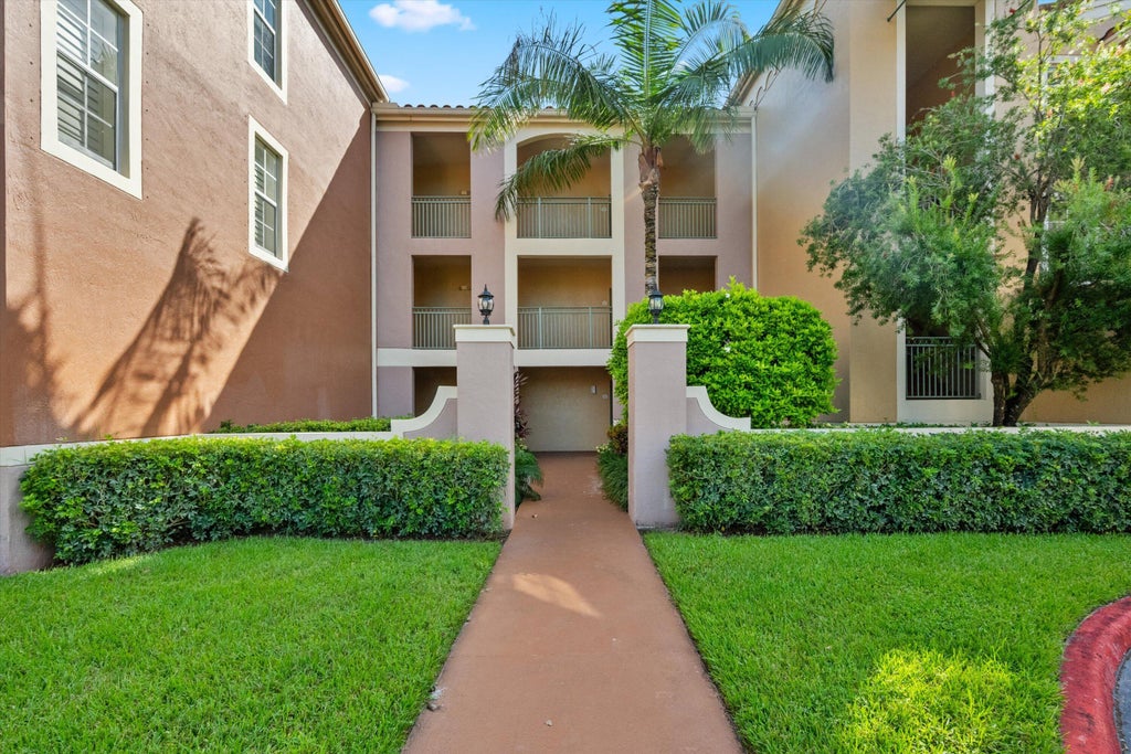 Photo of 11750 SAINT ANDREWS Place #208, Wellington, FL 33414 (MLS # B26081908)