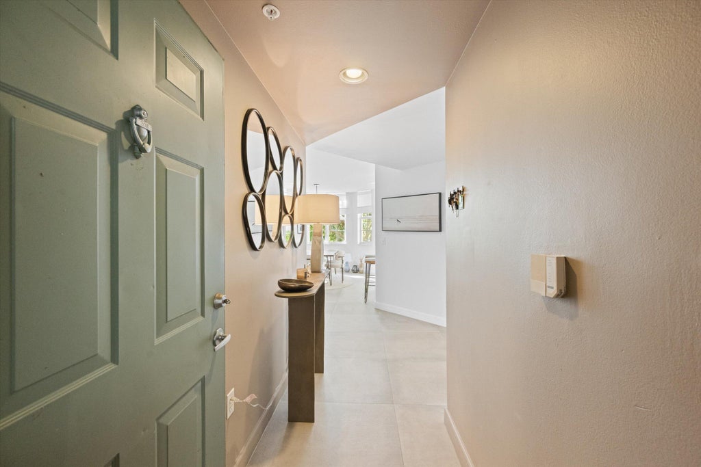 Photo of 11750 SAINT ANDREWS Place #208, Wellington, FL 33414 (MLS # B26081908)