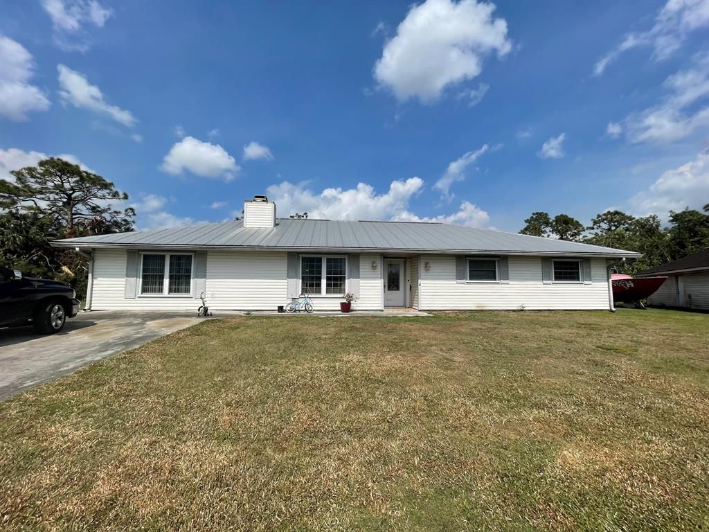 Photo of 7375 SW 33rd Street, Palm City, FL 34990 (MLS # R10783205)