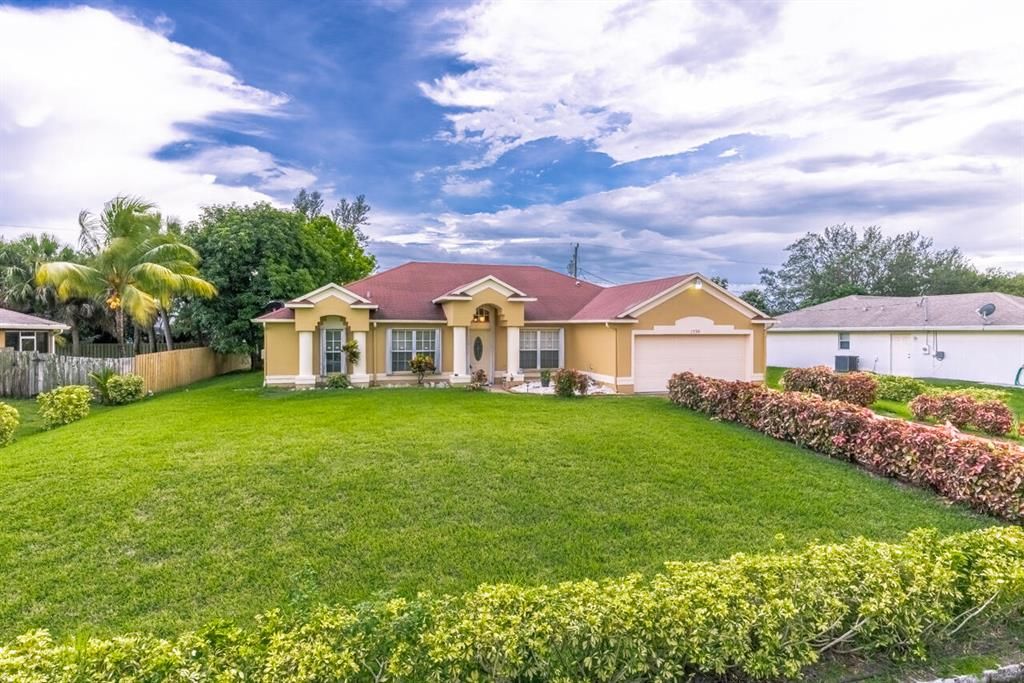 Photo of 1530 SW Escobar Lane, Port Saint Lucie, FL 34953 (MLS # R10735942)