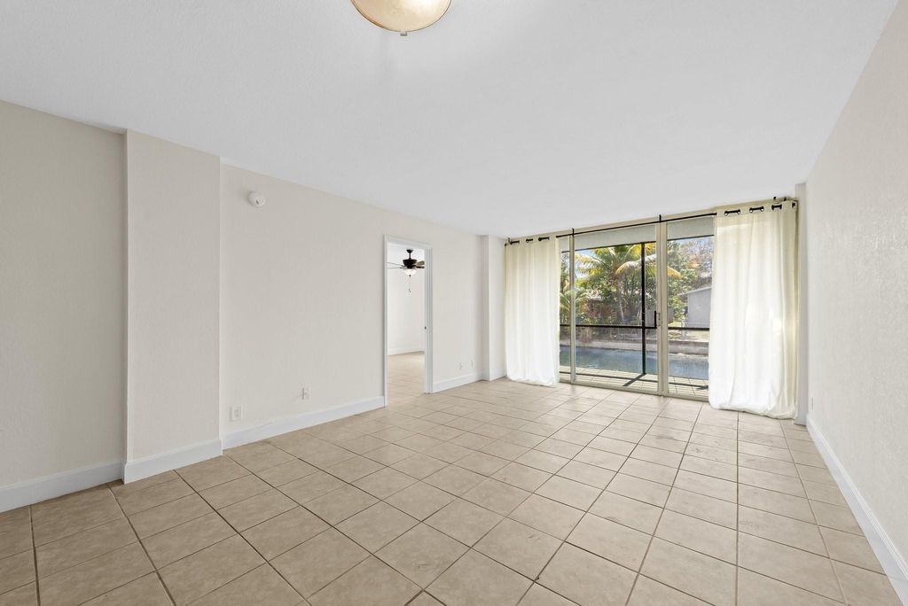 Photo of 111 Royal Park Dr #1C, Oakland Park, FL 33309 (MLS # F10516314)