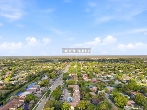 Tiny photo for 11319 Royal Palm Boulevard #B-2, Coral Springs, FL 33065 (MLS # B26010803)