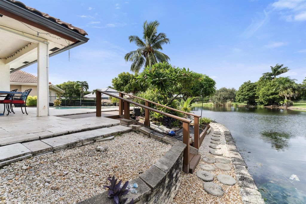Photo of 851 SW 87th Terrace, Plantation, FL 33324 (MLS # R11004403)