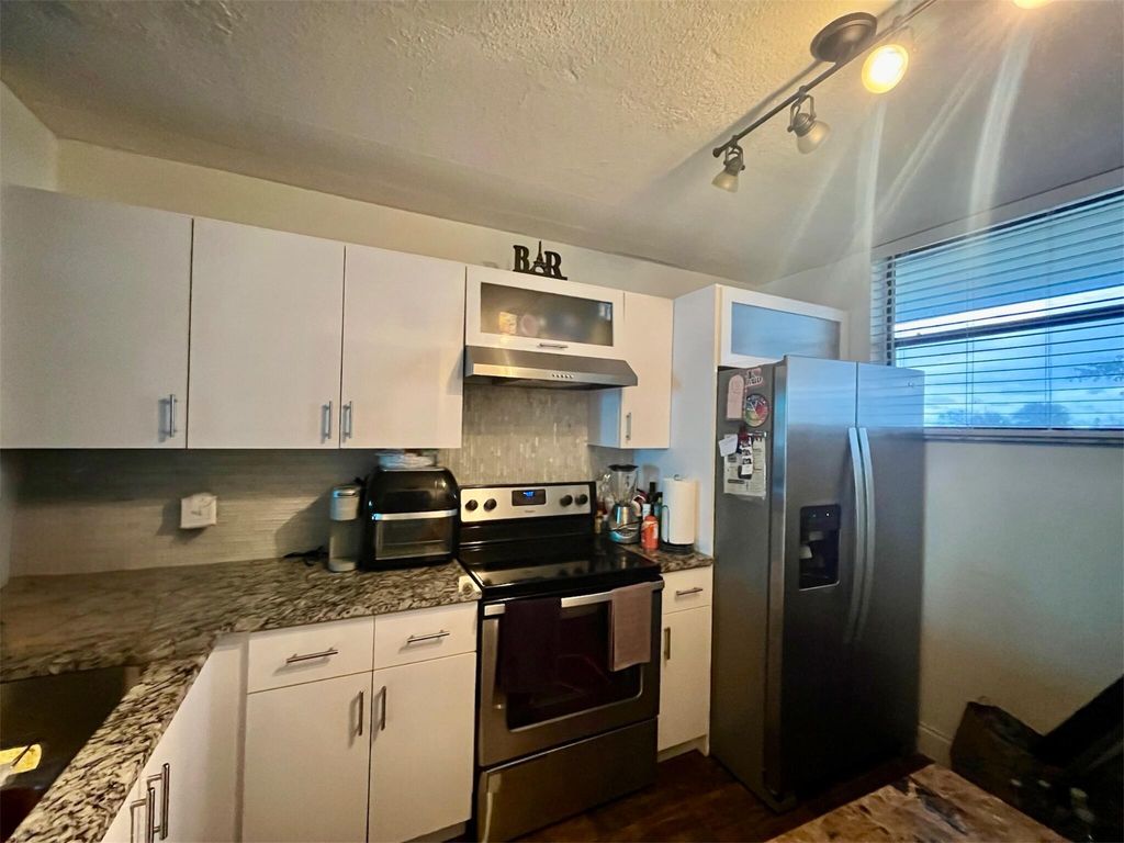 Photo of 113 Lake Emerald Drive #209, Oakland Park, FL 33309 (MLS # B26020986)