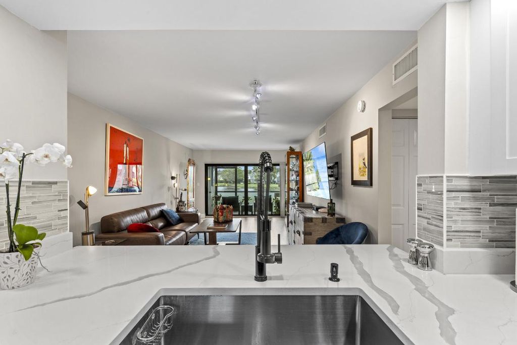 Photo of 12829 Briarlake Drive #102, Palm Beach Gardens, FL 33418 (MLS # R11096952)