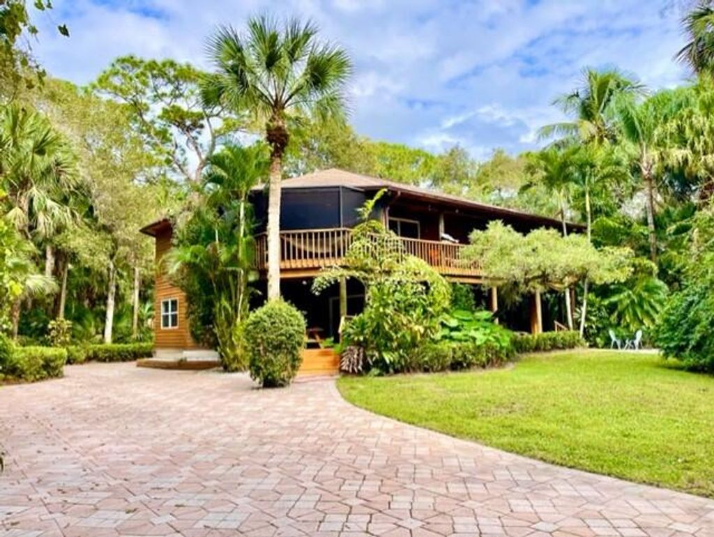 Photo of 9470 Sandy Run, Jupiter, FL 33478 (MLS # R10847125)