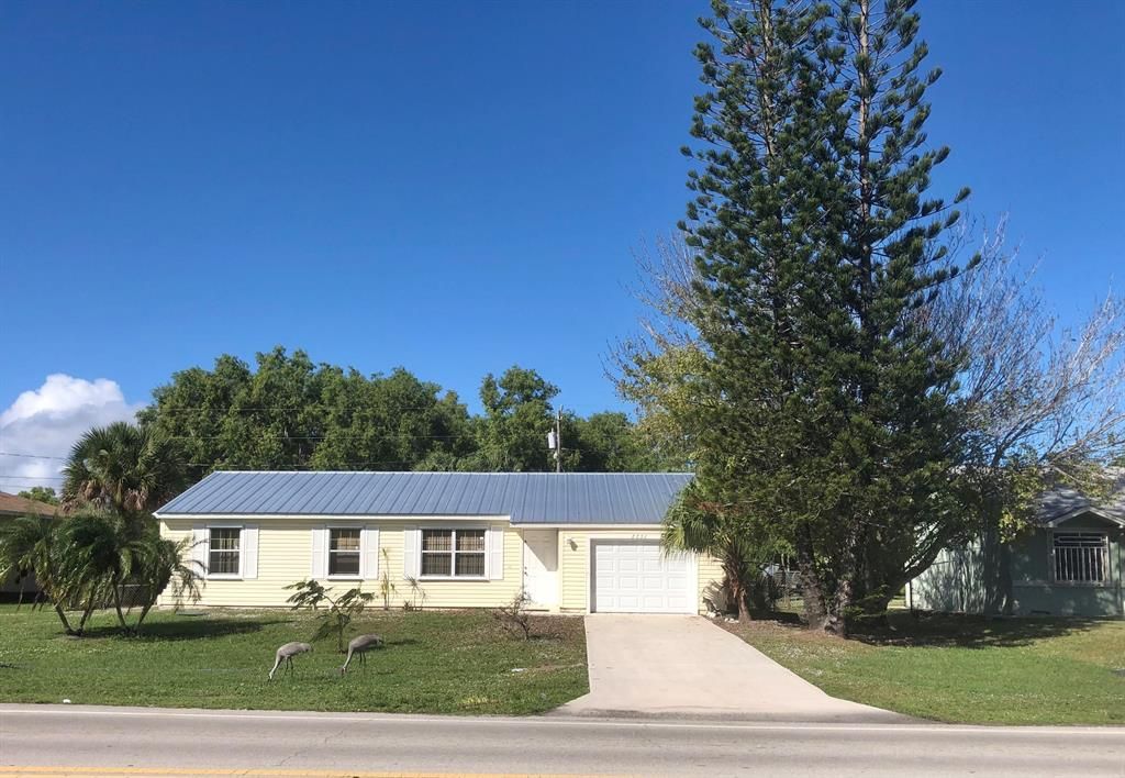 Photo of 2751 SE Melaleuca Boulevard SE, Port Saint Lucie, FL 34952 (MLS # R10766382)