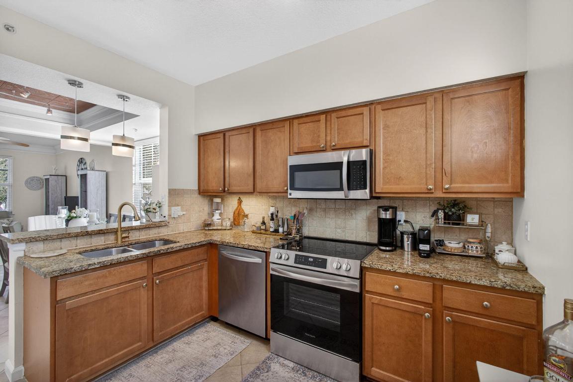 SOMERSET AT ABACOA CONDO - Residential