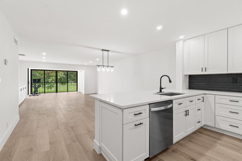 Photo of 12910 Briarlake Drive #201, Palm Beach Gardens, FL 33418 (MLS # R11106017)