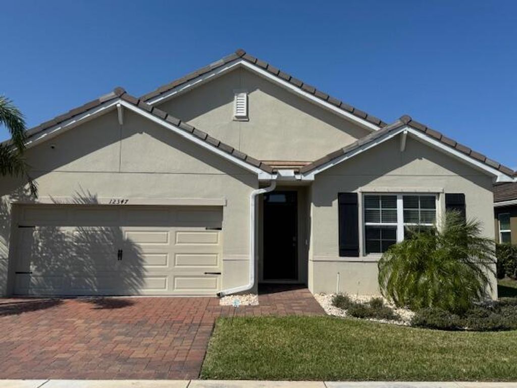 Photo of 12347 SW Arabella Drive, Port Saint Lucie, FL 34987 (MLS # R11072463)