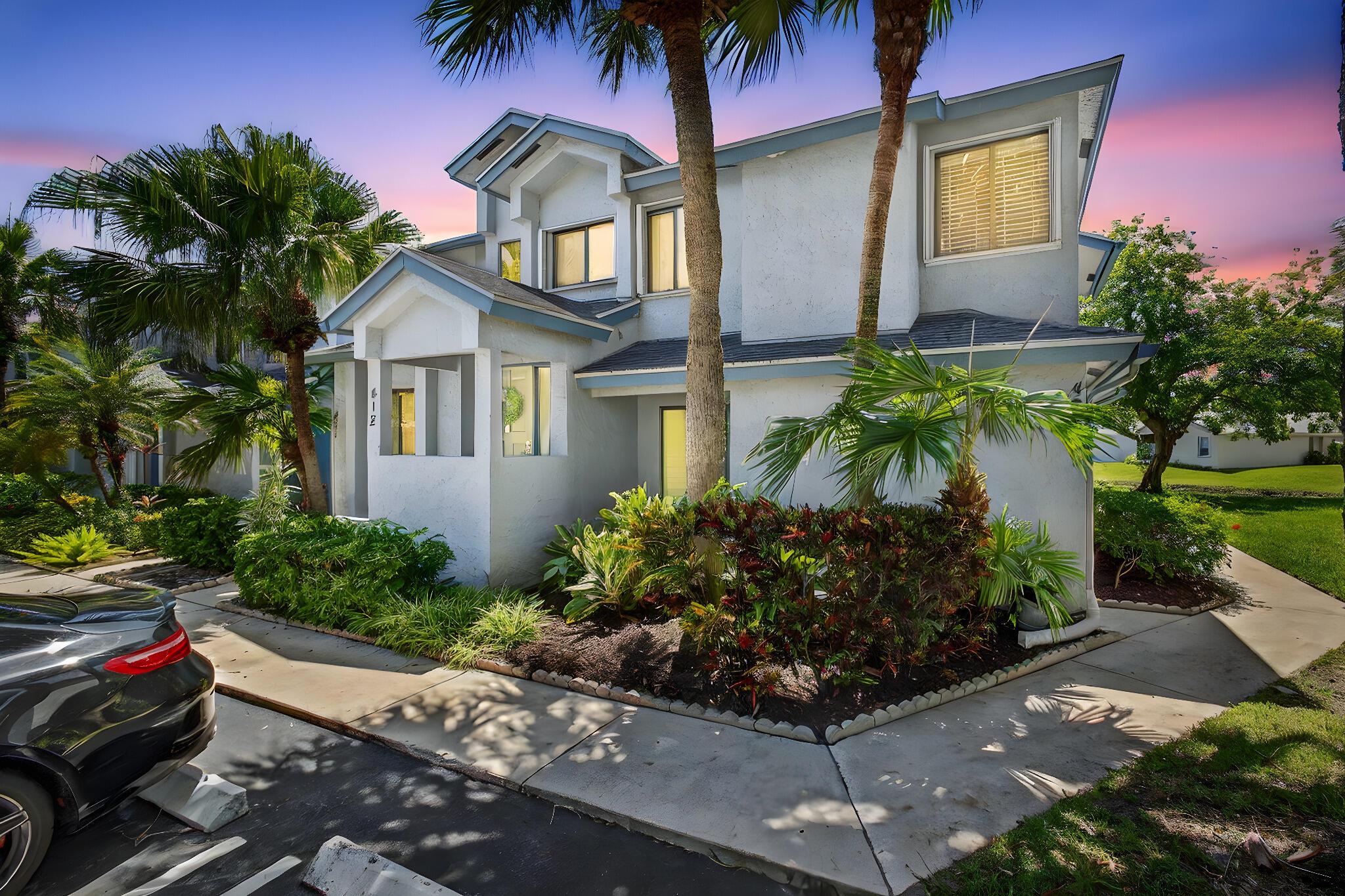 Welcome to this beautiful three-bedroom, two-bathroom condo in the highly sought-after community of River Bridge, in the beautiful Harbour Pointe Condo Village. This residence features new hurricane impact windows throughout, impact front door, a screened and covered patio enclosure, and a tranquil lakefront setting where you can enjoy breathtaking sunset views. This home offers an open floor plan on the first floor for ease of access. Kitchen is updated and beautiful with stainless and a brand new dishwasher. New washer and dryer. Bedrooms are large and light and bright. Updating flooring throughout. One of my favorite aspects of the home is it is an end unit on the main floor which gives you a private entrance and tons of natural light.