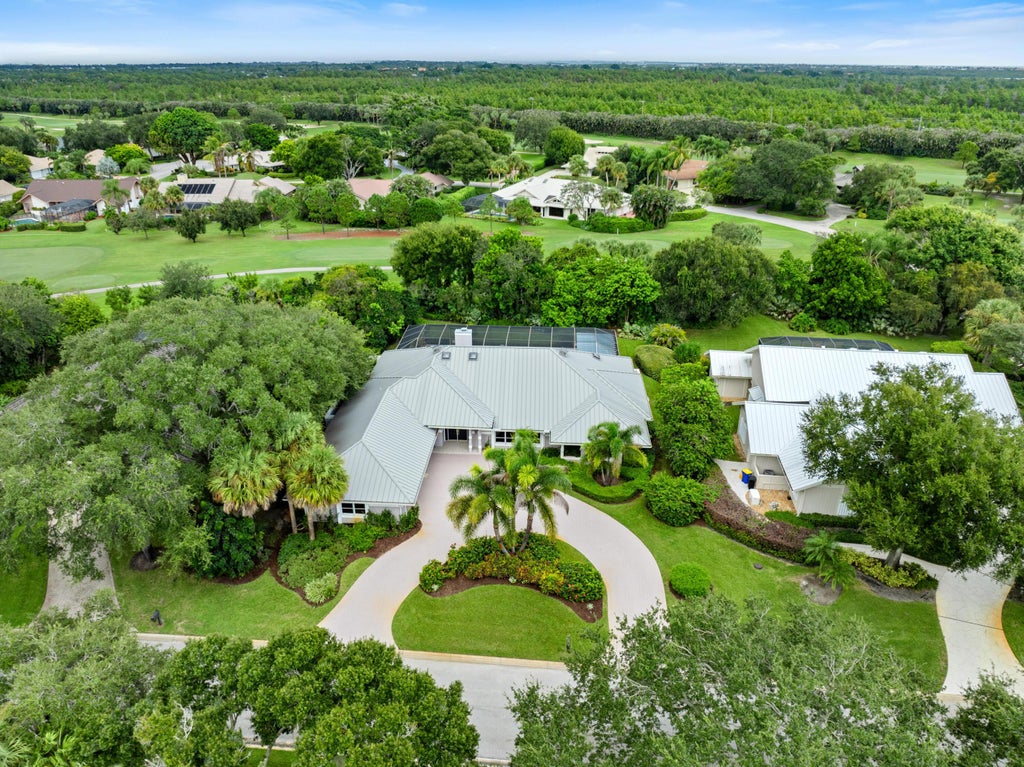 Photo of 5883 SE Glen Eagle Way, Stuart, FL 34997 (MLS # B26079540)