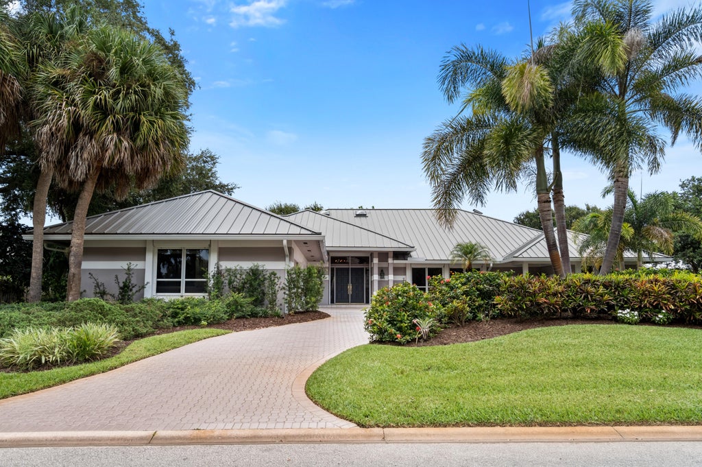 Photo of 5883 SE Glen Eagle Way, Stuart, FL 34997 (MLS # B26079540)