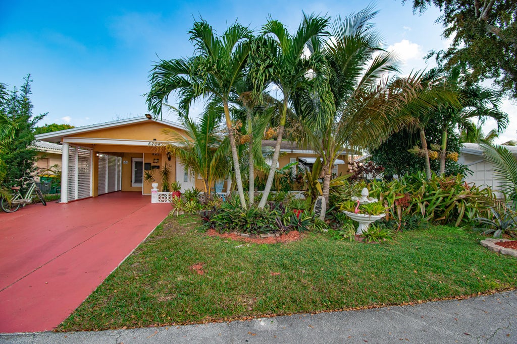 Photo of 5704 NW 47th Lane, Tamarac, FL 33319 (MLS # B26072650)