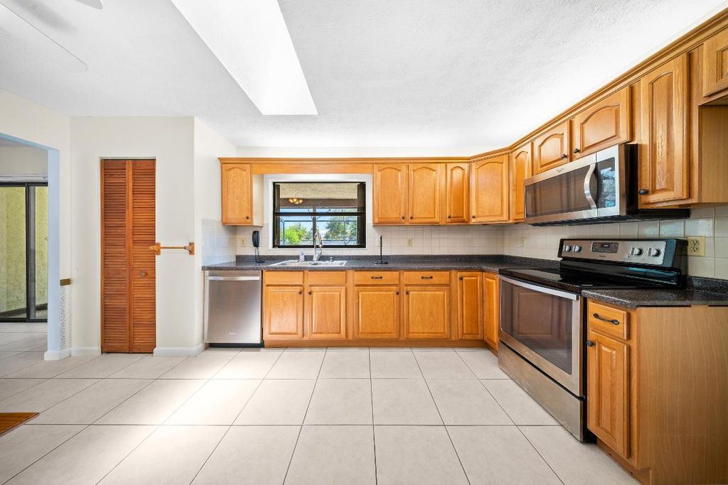 Photo of 441 SW Curtis Street, Port Saint Lucie, FL 34983 (MLS # R11111575)