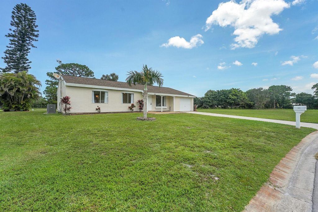 Photo of 2073 SE Talwood Lane, Port Saint Lucie, FL 34952 (MLS # R11115607)