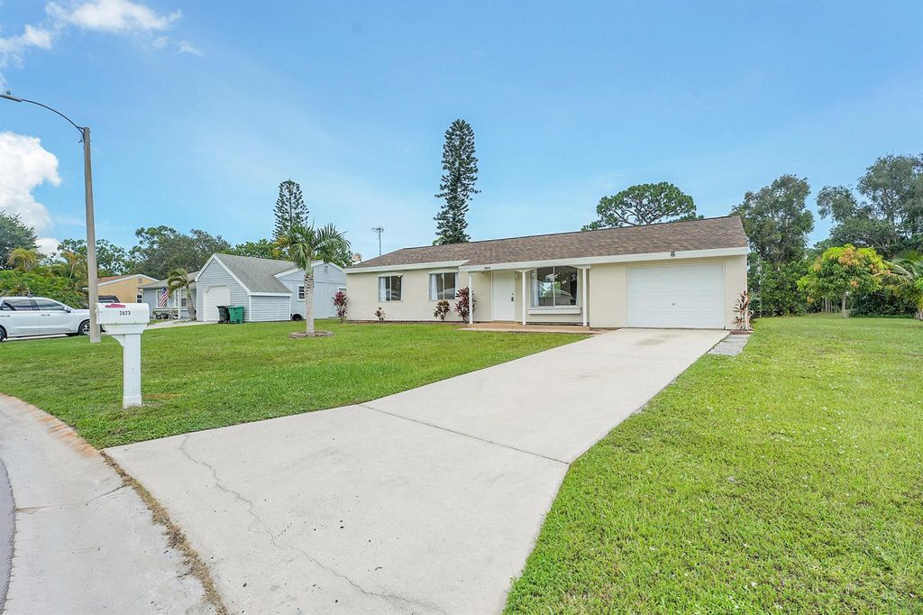 Photo of 2073 SE Talwood Lane, Port Saint Lucie, FL 34952 (MLS # R11115607)