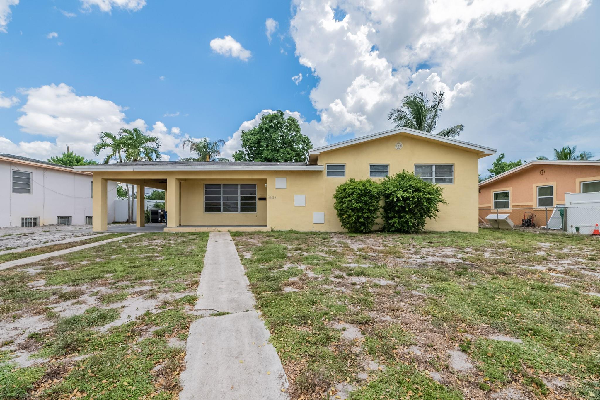 Multi-level home featuring 3 bedrooms and 2 bathrooms, a 1-car carport, and a welcoming front porch. Enjoy sliding glass doors leading to an enclosed back porch and a spacious, fenced backyard with a private in-ground pool. Do not miss out. Schedule a showing today! One or more photos have been virtually staged.