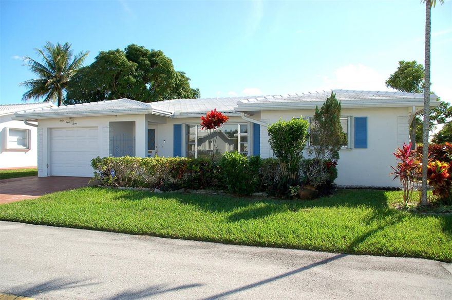 Desirable location - CORNER LOT!  One of the largest models (1649 sq. ft).  2/2 with 1cg and large Florida Room.  Easy to convert to 3rd bedroom or enjoy the spacious layout that is great for entertaining. Kitchen and baths have been remodeled/updated.   Roof was replaced 2019, updated electric, tile floor throughout.  Parking for (3) cars with the garage and double wide driveway.  55+ community (at least one occupant needs to be 55 and no one under 18)  The community is pet friendly with low HOA fees.  Community maintains and cuts the grass, pressure wash the roof approx. every 2 years and paints the exterior of the home approx. every 5 years.  Cannot lease for the first 2 years.  As per the association no credit score or down payment requirements.  FHA and VA eligible. Please be advised, BLIND OFFERS WILL NOT BE CONSIDERED OR RESPONDED TO.