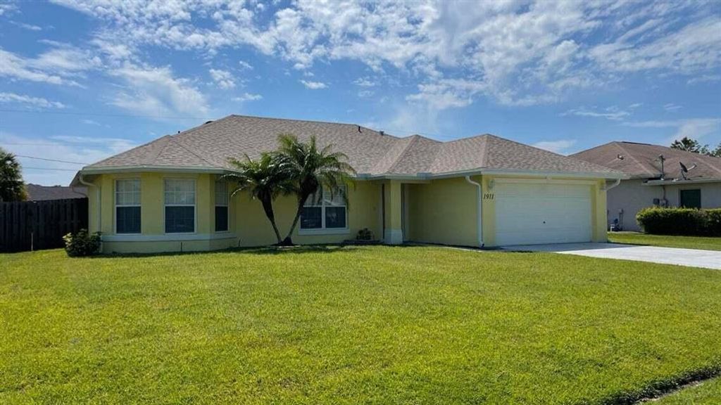 Photo of 1911 SE Camilo Street, Port Saint Lucie, FL 34952 (MLS # R10876886)