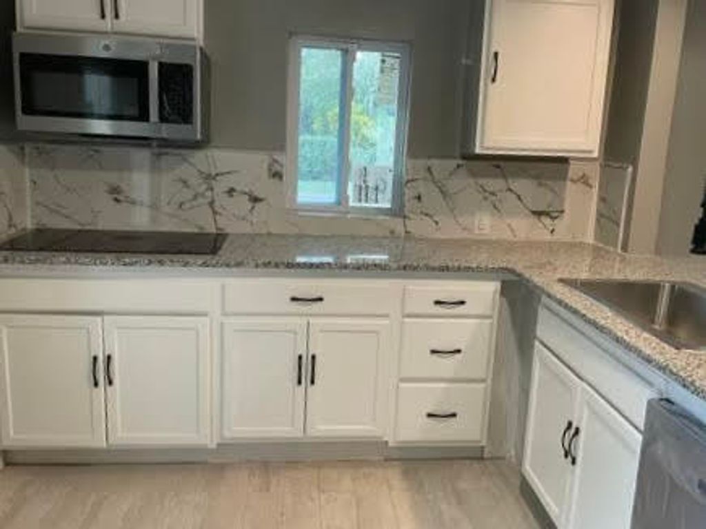 Photo of 1617 E Avenue, Fort Pierce, FL 34950 (MLS # R10997033)