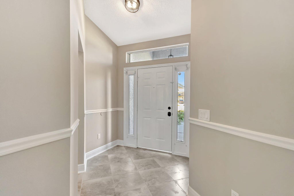 Photo of 5647 NW Lorna Court, Port Saint Lucie, FL 34986 (MLS # R11102280)