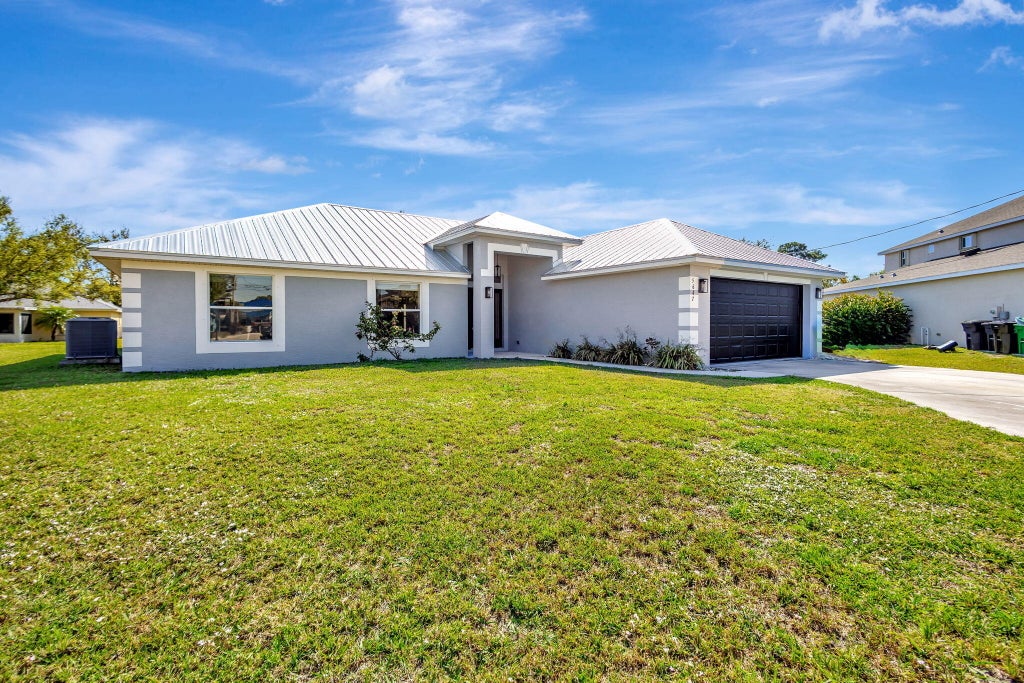 Photo of 5647 NW Lorna Court, Port Saint Lucie, FL 34986 (MLS # R11102280)