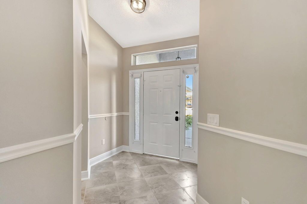 Photo of 5647 NW Lorna Court, Port Saint Lucie, FL 34986 (MLS # R11102280)