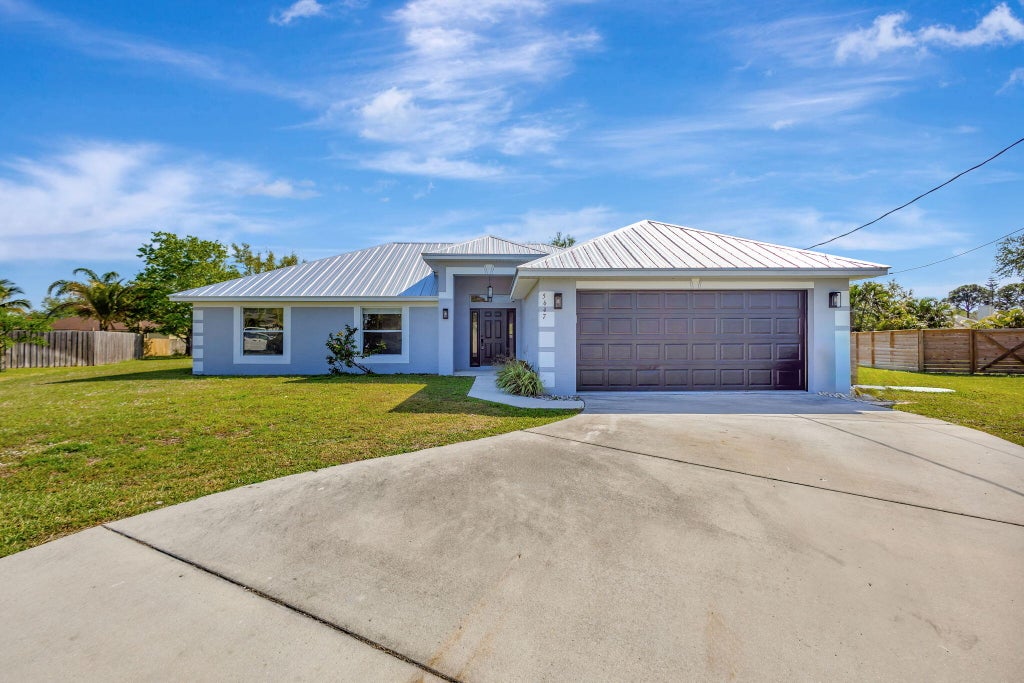 Photo of 5647 NW Lorna Court, Port Saint Lucie, FL 34986 (MLS # R11102280)