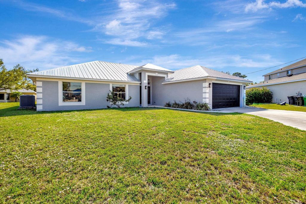 Photo of 5647 NW Lorna Court, Port Saint Lucie, FL 34986 (MLS # R11102280)