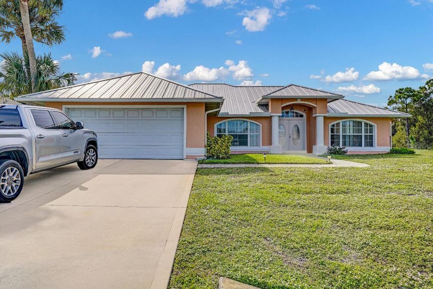 This property has it all! Waterfront home with 3 Beds, 2 Baths, a swimming pool and your very own dock. NO HOA! Previously offered as an Airbnb. Gorgeous custom built home with plank flooring, vaulted ceiling and spacious bedrooms and bathrooms. Kitchen features white cabinetry, granite counters and a flexible area that could be an eat in kitchen, office or family room. Experience privacy with no rear neighbors and enjoy the scenic views of the water, lush landscaping and pool. Screened in pool offers plenty of space for lounge chairs and a covered area perfect for an outdoor living or dining area. Enjoy fishing with the convenience of your own dock along the canal. Peace of mind with a newer metal roof. Less than 15 minutes to the beach, shopping, dining and entertainment in Vero Beach. Easy access to I-95. Call today for a private showing.